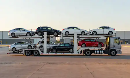 Car transporter parked in an industrial area of South Dakota, United States