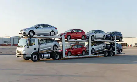 Car transporter loaded with vehicles in Belle Fourche, South Dakota, United States