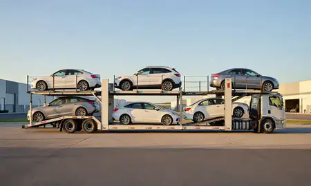Car transporter parked in an industrial area of Dell Rapids, South Dakota, United States