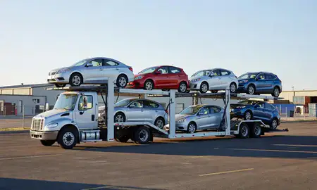 Car transporter loaded with vehicles in Dell Rapids, South Dakota, United States