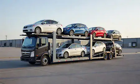 Car transporter loaded with vehicles in Harrisburg, South Dakota, United States