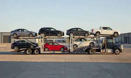 Car transporter parked in an industrial area of Hartford, South Dakota, United States