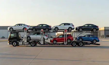 Car transporter parked in an industrial area of Hot Springs, South Dakota, United States
