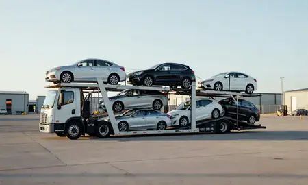 Car transporter loaded with vehicles in Milbank, South Dakota, United States