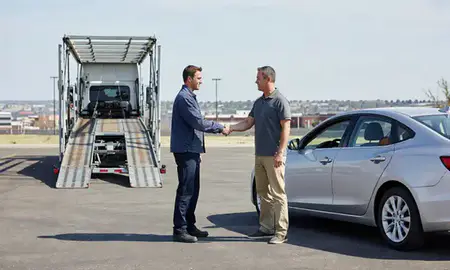 Vehicle owner beside their delivered car in Rapid City, South Dakota, United States