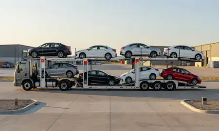 Car transporter parked in an industrial area of Spearfish, South Dakota, United States