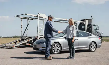 Vehicle owner beside their delivered car in Vermillion, South Dakota, United States