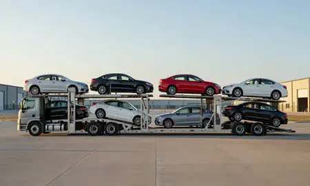 Car transporter parked in an industrial area of Vermillion, South Dakota, United States