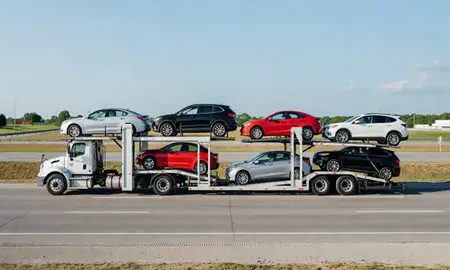 Multi-level car carrier on the highway to Bartlett, Tennessee, United States