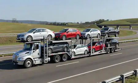 Multi-level car carrier on the highway to Chattanooga, Tennessee, United States