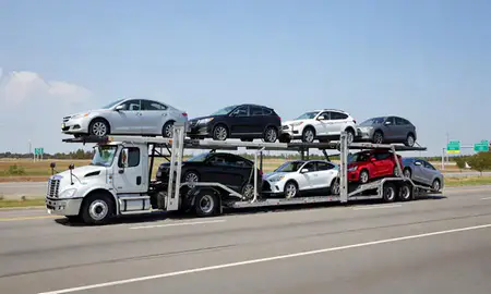 Multi-level car carrier on the highway to Collierville, Tennessee, United States