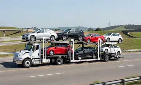Multi-level car carrier on the highway to Cookeville, Tennessee, United States