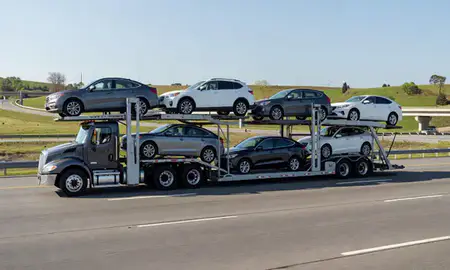 Multi-level car carrier on the highway to Franklin, Tennessee, United States