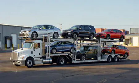 Car transporter loaded with vehicles in Franklin, Tennessee, United States
