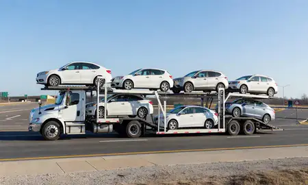 Multi-level car carrier on the highway to Germantown, Tennessee, United States