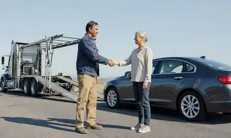 Vehicle owner beside their delivered car in Hendersonville, Tennessee, United States
