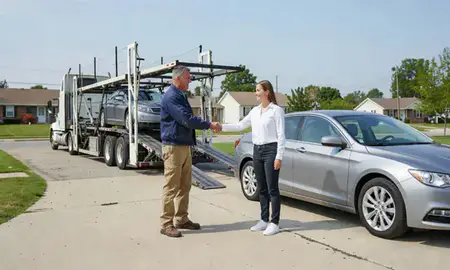 Vehicle owner beside their delivered car in Johnson City, Tennessee, United States