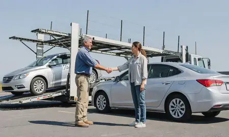 Vehicle owner beside their delivered car in Maryville, Tennessee, United States
