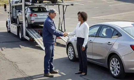 Vehicle owner beside their delivered car in Memphis, Tennessee, United States