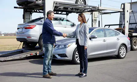 Vehicle owner beside their delivered car in Morristown, Tennessee, United States