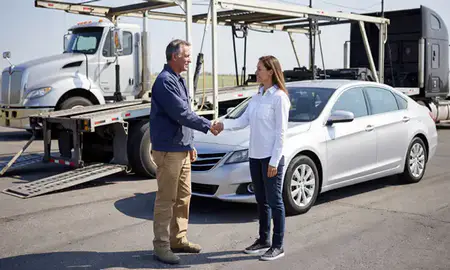 Vehicle owner beside their delivered car in Murfreesboro, Tennessee, United States