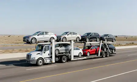 Multi-level car carrier on the highway to Texas, United States