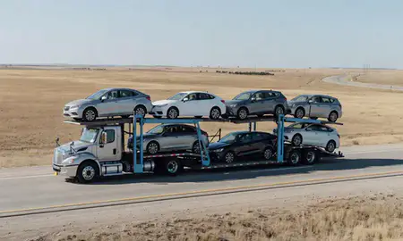 Multi-level car carrier on the highway to Amarillo, Texas, United States