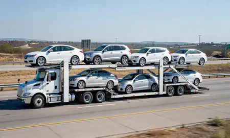 Multi-level car carrier on the highway to Austin, Texas, United States