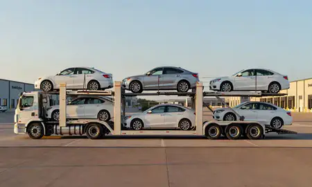 Car transporter parked in an industrial area of Denton, Texas, United States