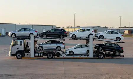 Car transporter loaded with vehicles in Grand Prairie, Texas, United States