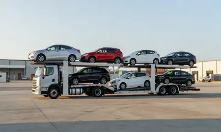 Car transporter loaded with vehicles in McKinney, Texas, United States