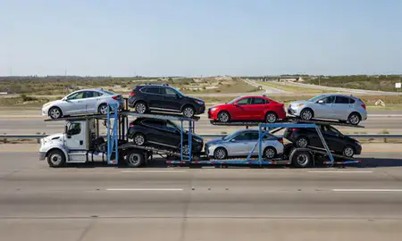 Multi-level car carrier on the highway to Odessa, Texas, United States