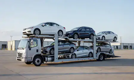Car transporter loaded with vehicles in Plano, Texas, United States