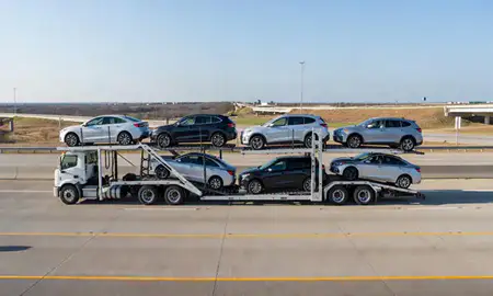 Multi-level car carrier on the highway to San Antonio, Texas, United States