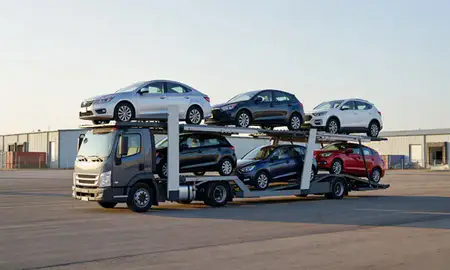 Car transporter loaded with vehicles in Tyler, Texas, United States