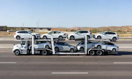 Multi-level car carrier on the highway to Utah, United States