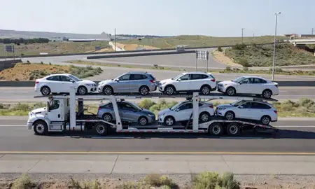 Multi-level car carrier on the highway to Draper, Utah, United States