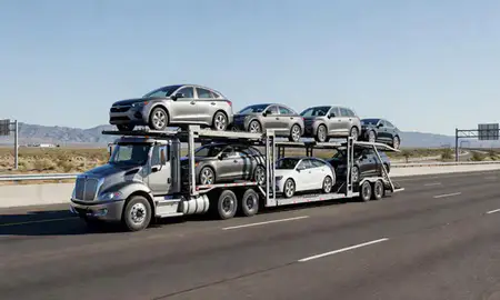 Multi-level car carrier on the highway to Eagle Mountain, Utah, United States