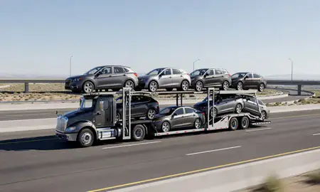 Multi-level car carrier on the highway to Herriman, Utah, United States