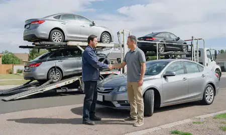 Vehicle owner beside their delivered car in Kearns, Utah, United States