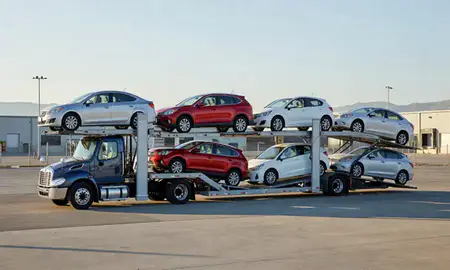 Car transporter loaded with vehicles in Millcreek, Utah, United States