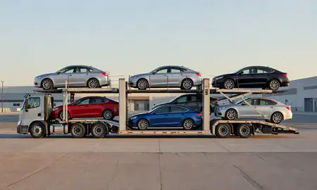 Car transporter parked in an industrial area of Ogden, Utah, United States
