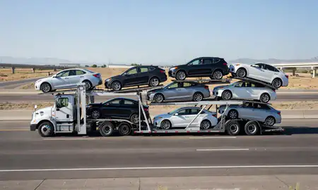 Multi-level car carrier on the highway to Orem, Utah, United States