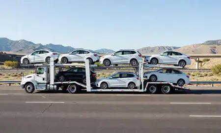 Multi-level car carrier on the highway to Provo, Utah, United States