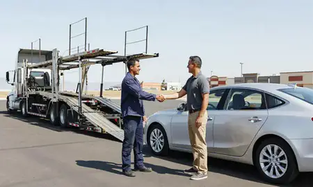 Vehicle owner beside their delivered car in Provo, Utah, United States