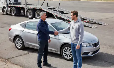 Vehicle owner beside their delivered car in Riverton, Utah, United States