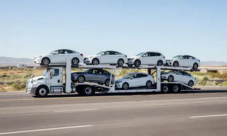 Multi-level car carrier on the highway to Sandy, Utah, United States