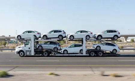 Multi-level car carrier on the highway to South Jordan, Utah, United States