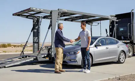 Vehicle owner beside their delivered car in South Jordan, Utah, United States