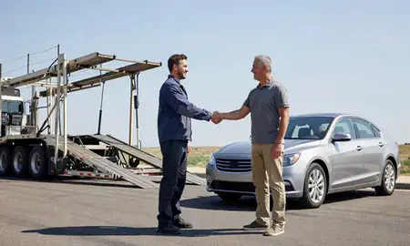 Vehicle owner beside their delivered car in Taylorsville, Utah, United States